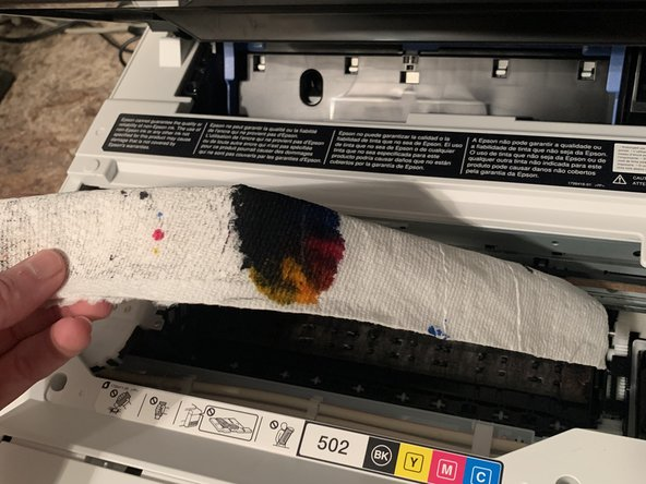 Guide Pratique : Déboucher Manuellement la Tête d'Impression de l'Epson ET-2760 en Cas de Problème d'Impression