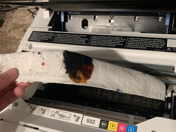 Guide Pratique : Déboucher Manuellement la Tête d'Impression de l'Epson ET-2760 en Cas de Problème d'Impression - Cartouche verte
